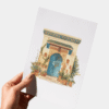 Hand houdt Marokkaanse Deur aquarel kaart vast (schaal)